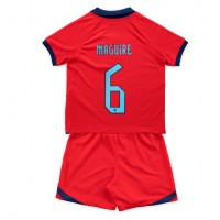 Maglie da calcio Inghilterra Harry Maguire #6 Seconda Maglia Bambino Mondiali 2022 Manica Corta (+ Pantaloni corti)